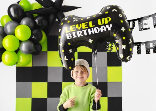 Gamepad formájú fólia lufi – Level Up Birthday felirattal